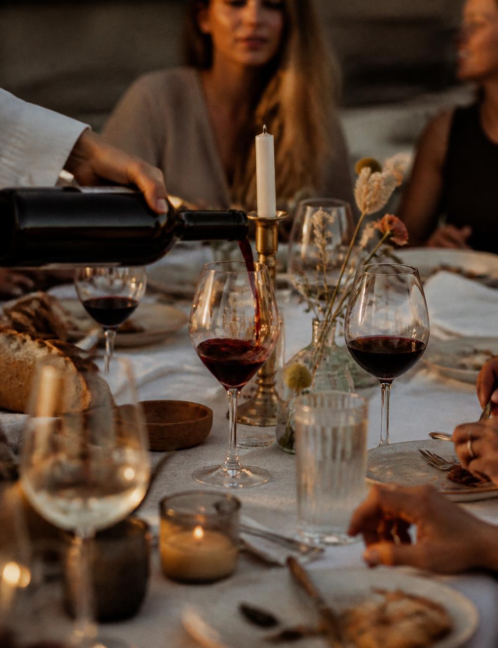 Candid dinner table scene in golden evening light